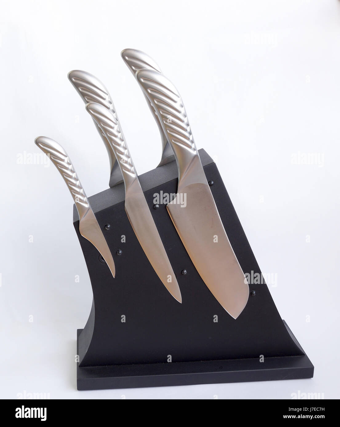 Set of knives for kitchen on a support Stock Photo Alamy