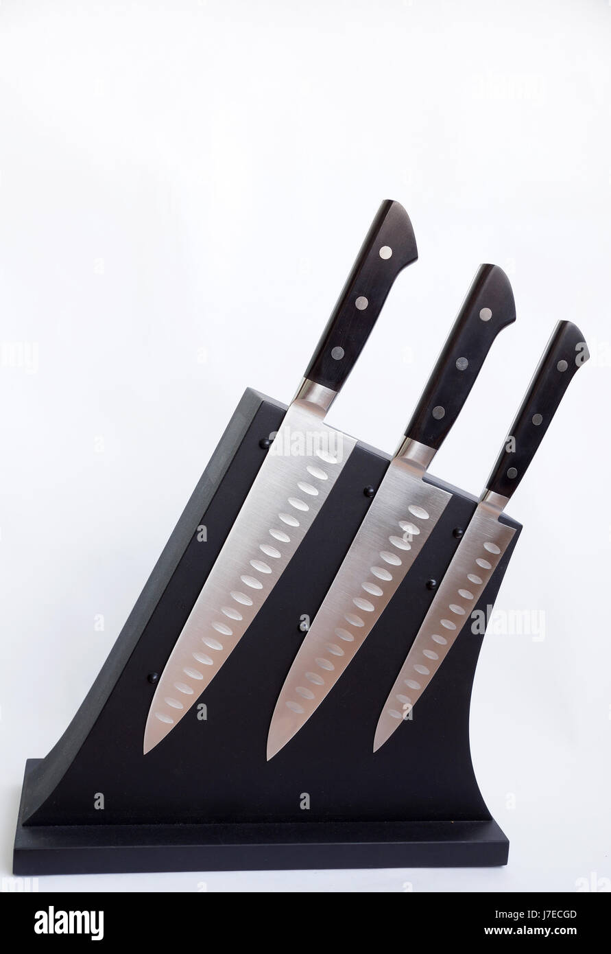Set of knives for kitchen on a support Stock Photo Alamy
