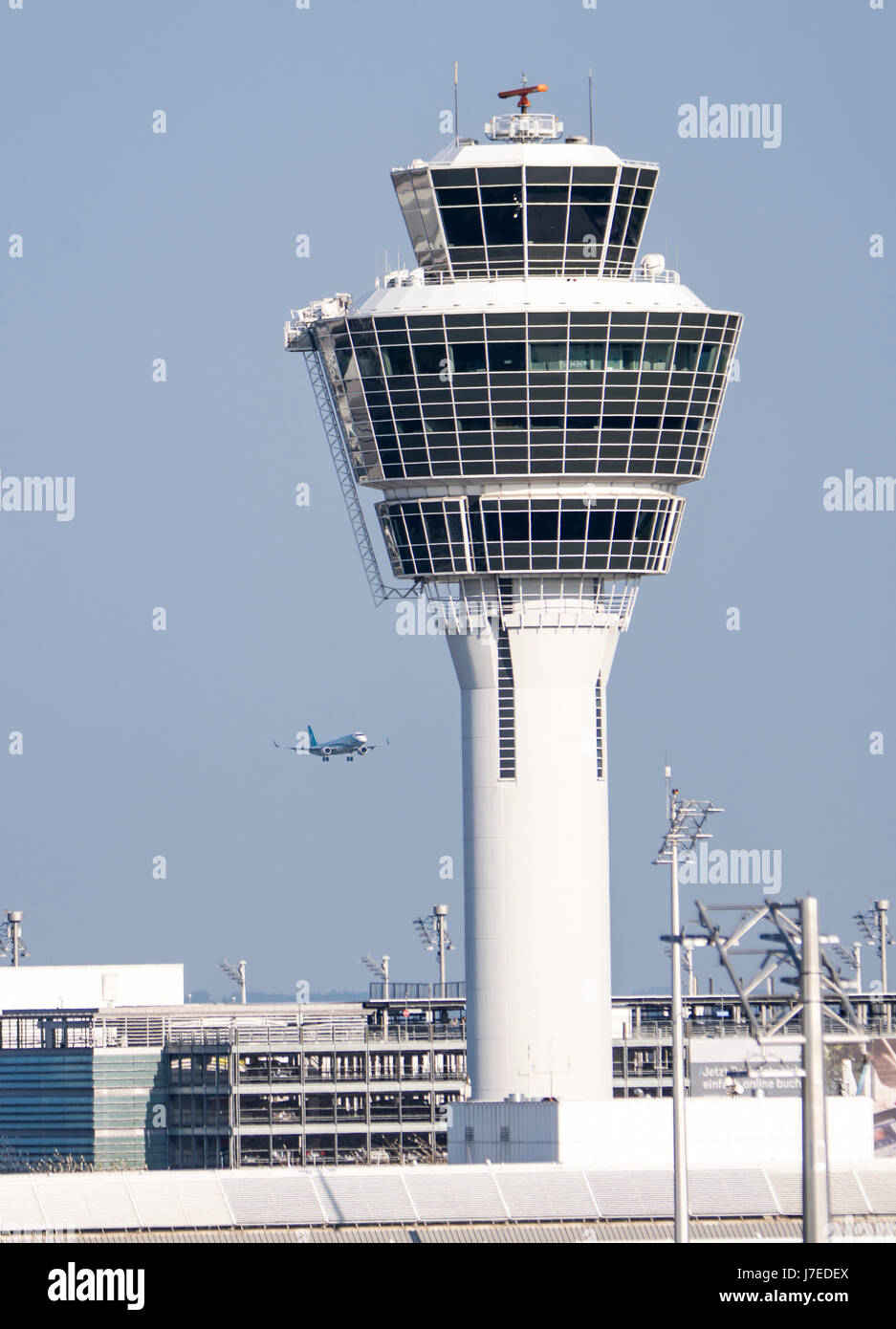 MUNICH, GERMANY - APRIL 9: Control tower of the the airport of Munich, Germany on April 9, 2017. The ariport has over 40 million passengers a year. Fo Stock Photo
