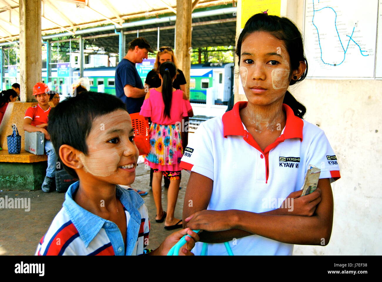 Burmese kids at a railway station, Yangon, Myanmar Stock Photo