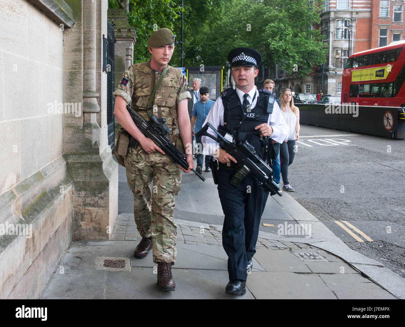 London, United Kingdom. 24th May 2017. Armed police and soldiers patrol