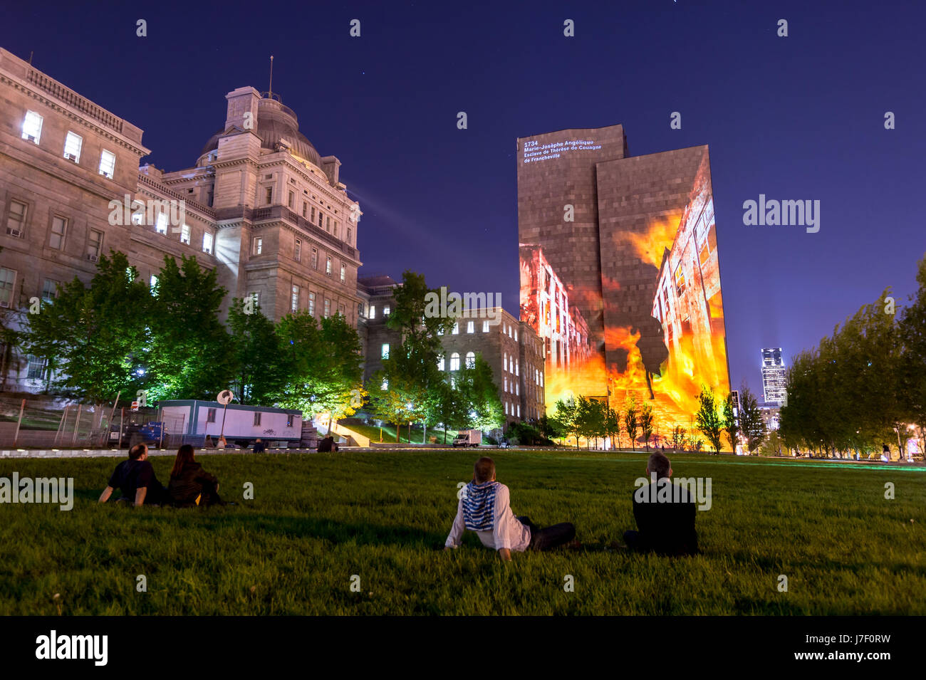 Montreal, Canada. 24th May, 2017.  Cité Mémoires Grand tableau onto the walls of the Montreal Court House (Champ-de-Mars). Cité Mémoire features 20 multimedia tableaux telling the history of Montreal. Credit: Marc Bruxelle/Alamy Live News Stock Photo