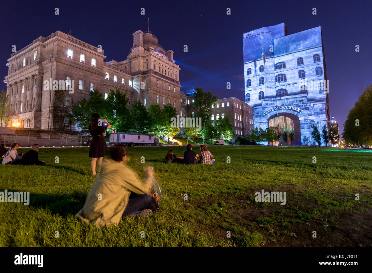 Montreal, Canada. 24th May, 2017.  Cité Mémoires Grand tableau onto the walls of the Montreal Court House (Champ-de-Mars). Cité Mémoire features 20 multimedia tableaux telling the history of Montreal. Credit: Marc Bruxelle/Alamy Live News Stock Photo