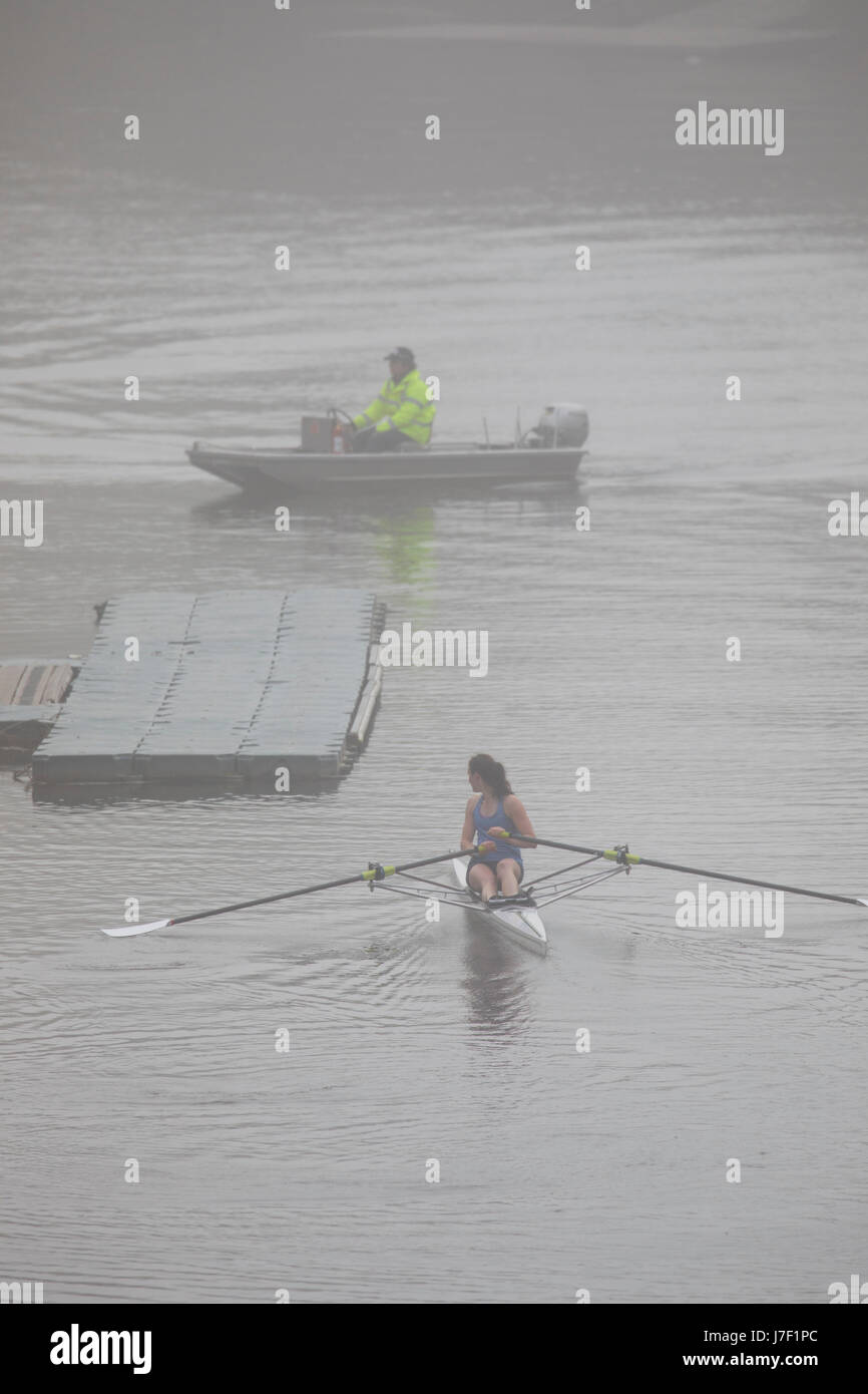 Chester, Cheshire, 25th May 2017 UK Weather. The day begins with foggy coastal and inland areas this morning before the sun burns it away to be yet another hot day for many in the UK. A foggy start in Chester for this rower on the River Dee before it becomes the hottest day of the year so far, this year.  © DGDImages/Alamy Live News Stock Photo