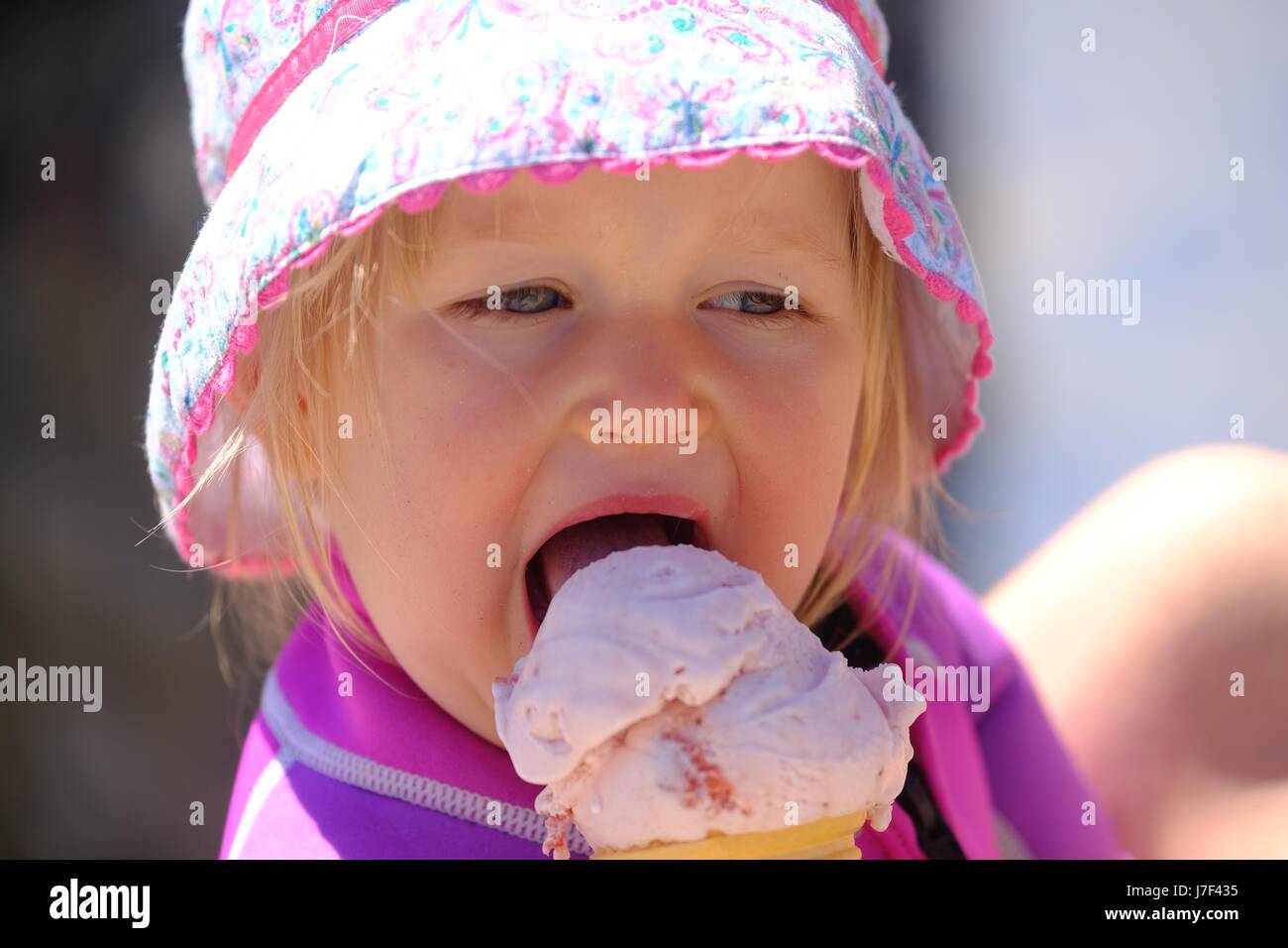 Lyme Regis, Dorset, UK. 25th May, 2017. This youngster enjoys an ice cream in Lyme Regis in bright sunshine and climbing temperatures. Credit: Tom Corban/Alamy Live News Stock Photo