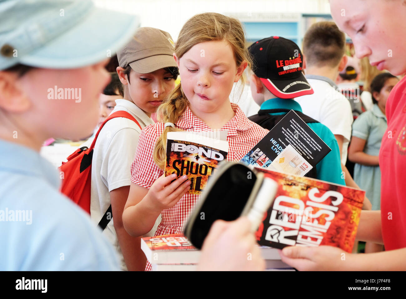 Hay Festival 2017 - Hay on Wye, Wales, UK - May 2017 - Local school children enjoy the  opening day of this years Hay Festival which celebrates its 30th anniversary in 2017. The children shown here are among the 70,000 books on sale in the Festival bookshop.  Credit: Steven May/Alamy Live News Stock Photo