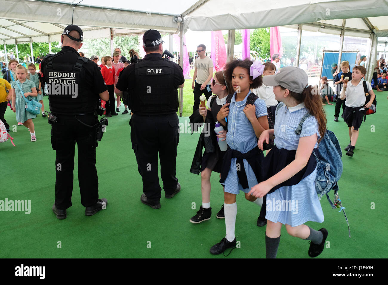 Hay Festival 2017 - Hay on Wye, Wales, UK - May 2017 - Armed police officers patrol the  opening day of this years Hay Festival which celebrates its 30th anniversary in 2017. Over 3,000 primary school children will attend Day 1 of the literary festival. Credit: Steven May/Alamy Live News Stock Photo