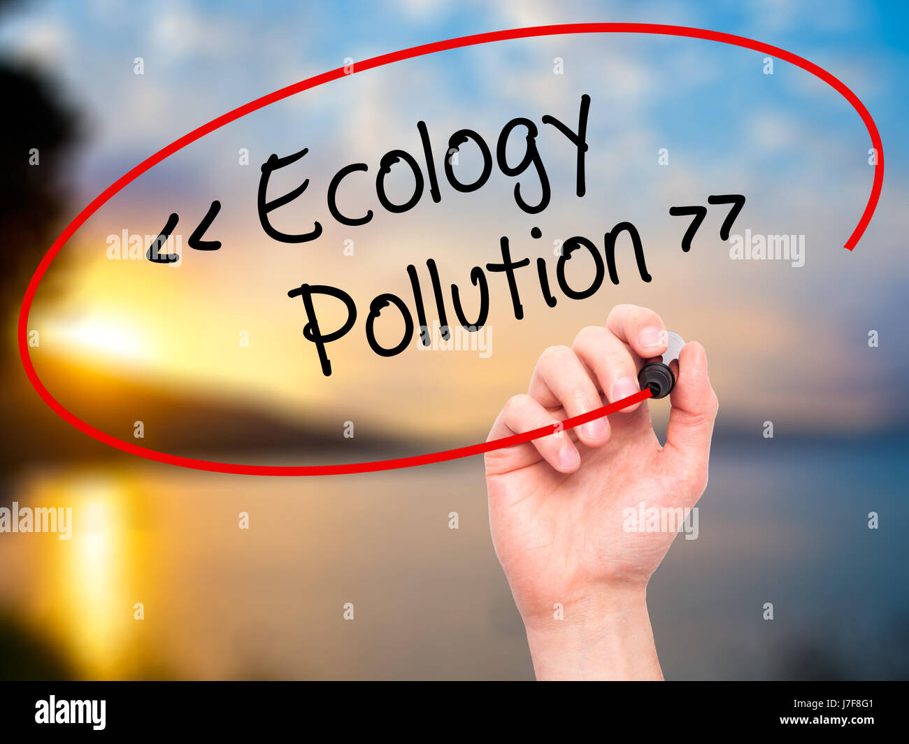 Man Hand writing Ecology - Pollution with black marker on visual screen ...