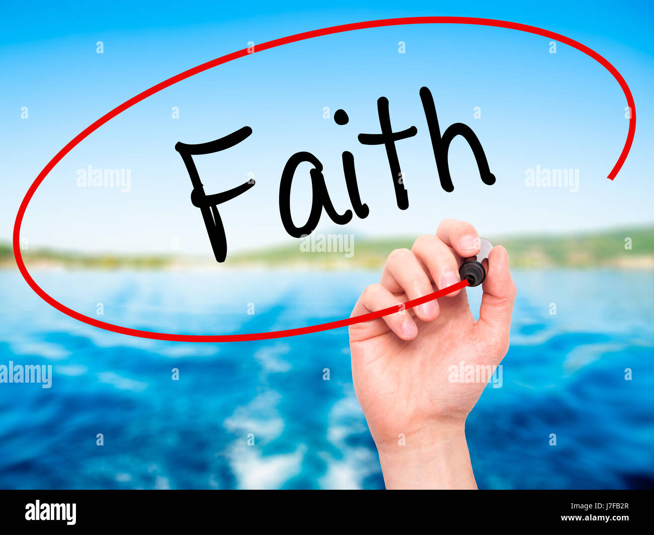 Man Hand writing Faith with black marker on visual screen. Isolated on ...