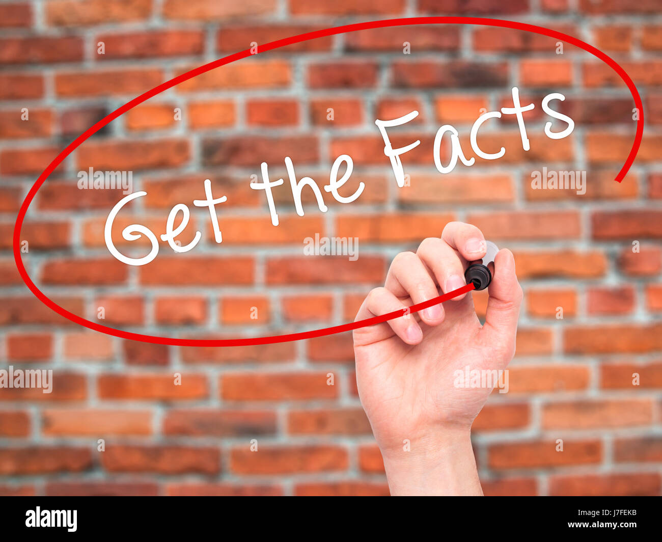 Man Hand writing Get the Facts with black marker on visual screen ...