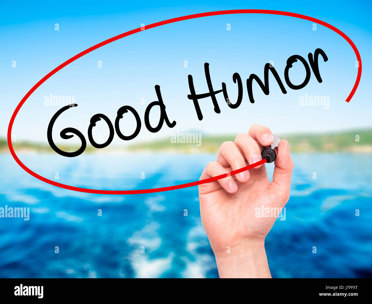 Man Hand writing Good Humor with black marker on visual screen ...