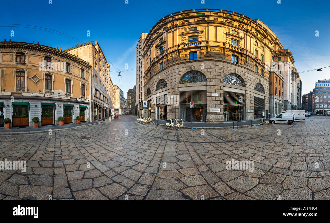 MILAN, ITALY - JANUARY 2, 2015:  Via Cesare Beccaria and Excelsior Department Store in Milan. Excelsior Store belongs to the Coin Group which is Italy Stock Photo