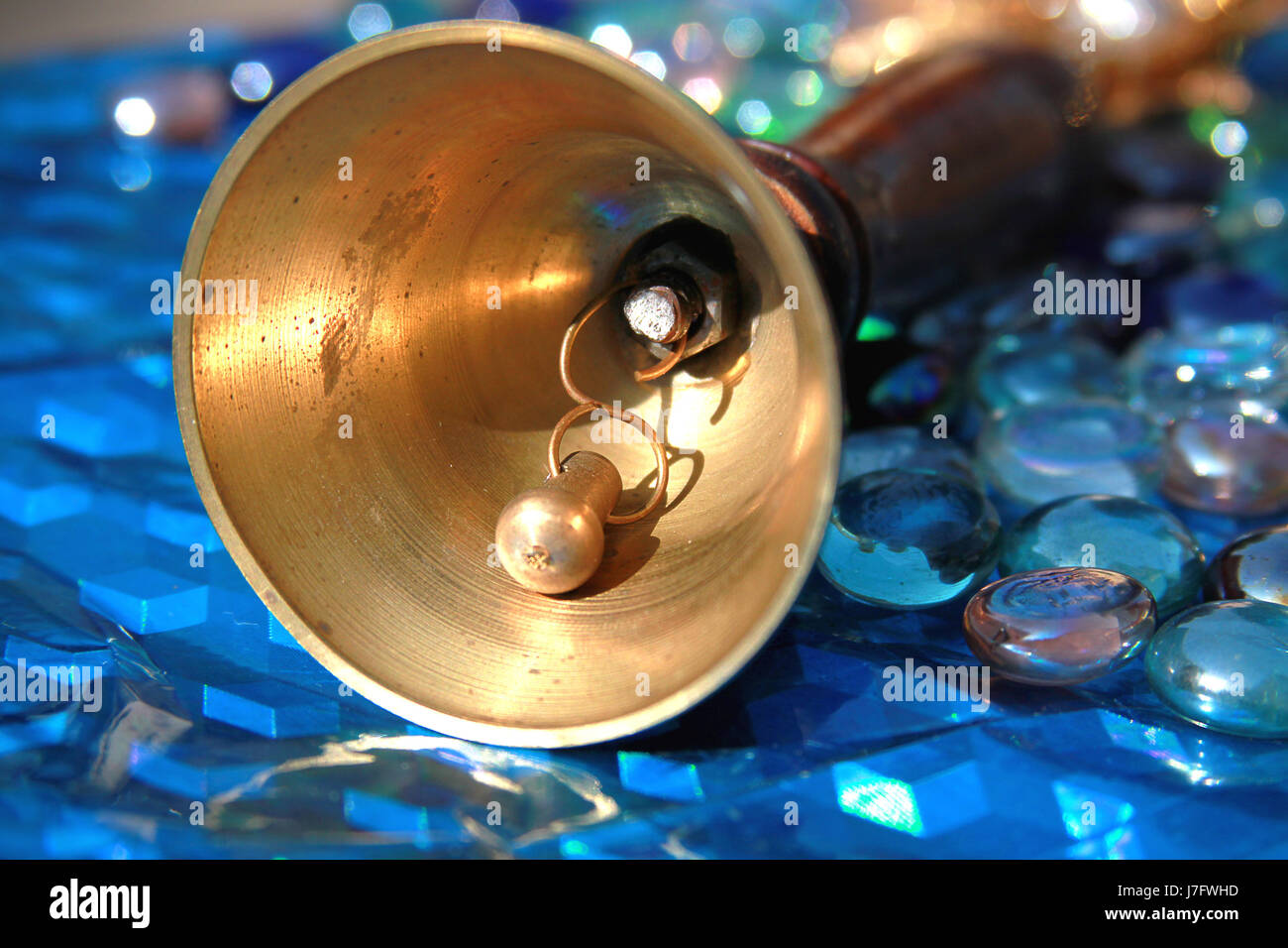 call ring religion religious church temple sound culture golden pray metal Stock Photo