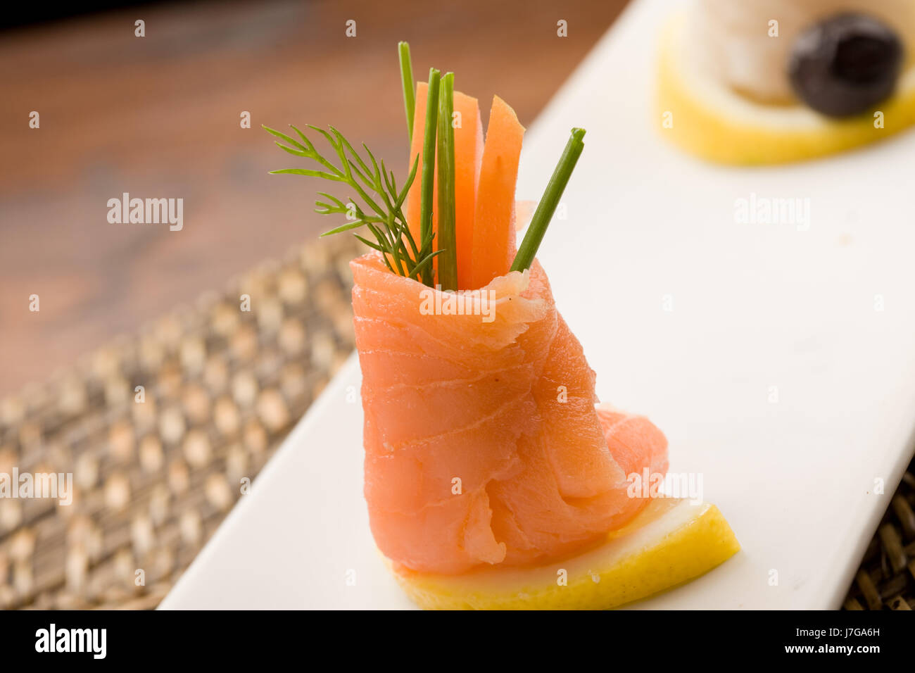 Table Food Rool food aliment fish rolls table rollers wrappedwith tomato salmon Stock ...
