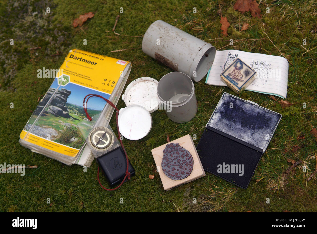 LETTERBOXING Godfrey Swinscow at Shipley Bridge, Dartmoor showing letterboxes and the stamps