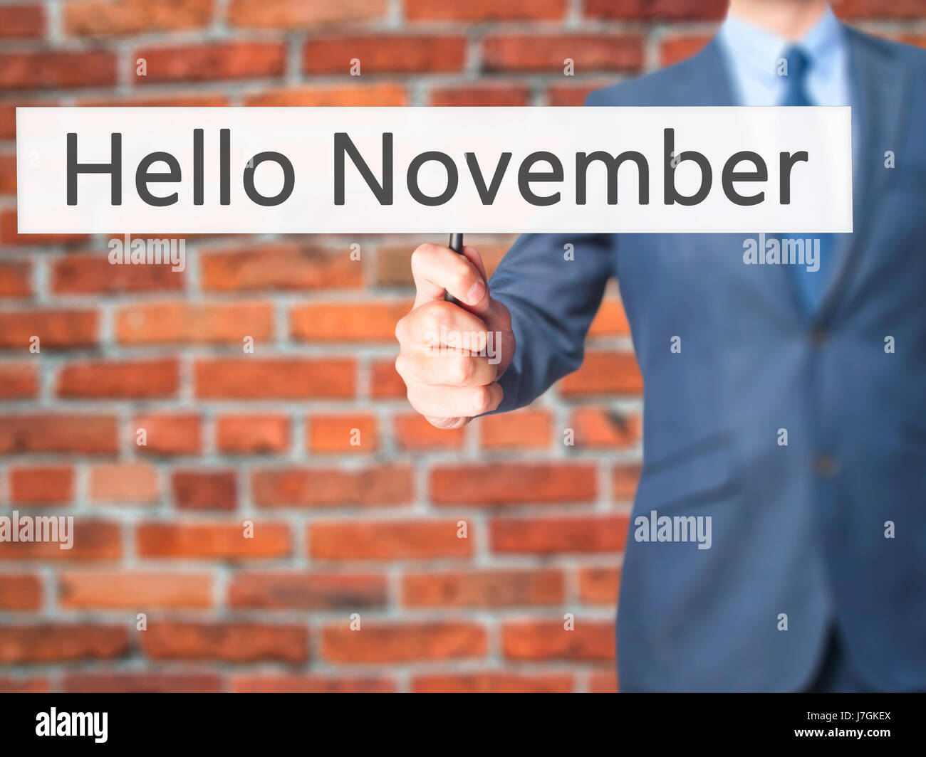 Hello November - Businessman hand holding sign. Business, technology ...