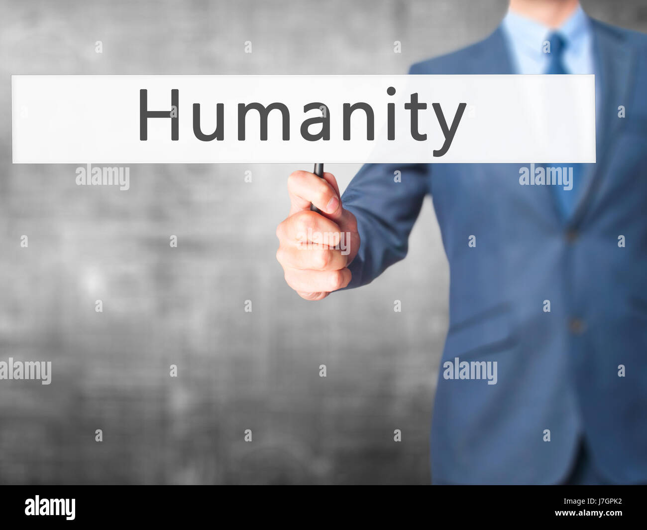 Humanity - Businessman hand holding sign. Business, technology ...