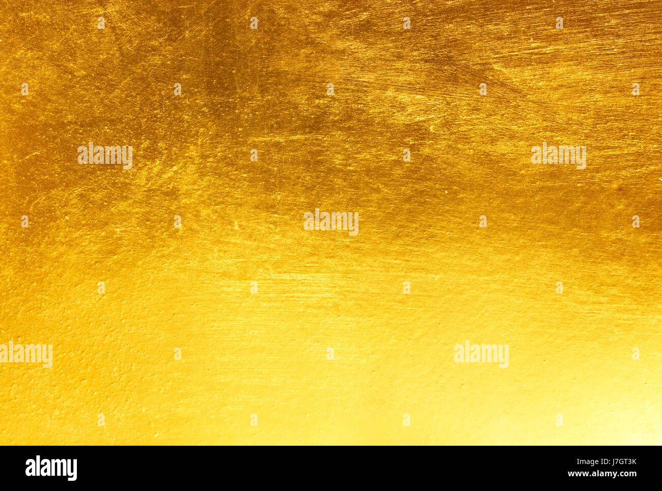 Shiny yellow leaf gold foil texture background Stock Photo Alamy
