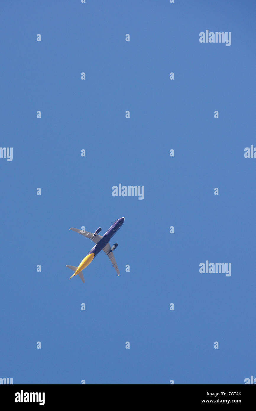 Aircraft against a blue sky Stock Photo - Alamy