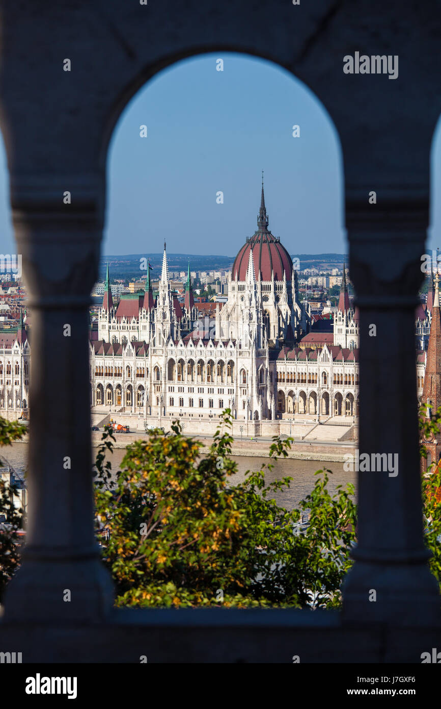 View of Hungarian Parliament Building with customers at Buda Castle restaurant, Budapest, Hungary Stock Photo