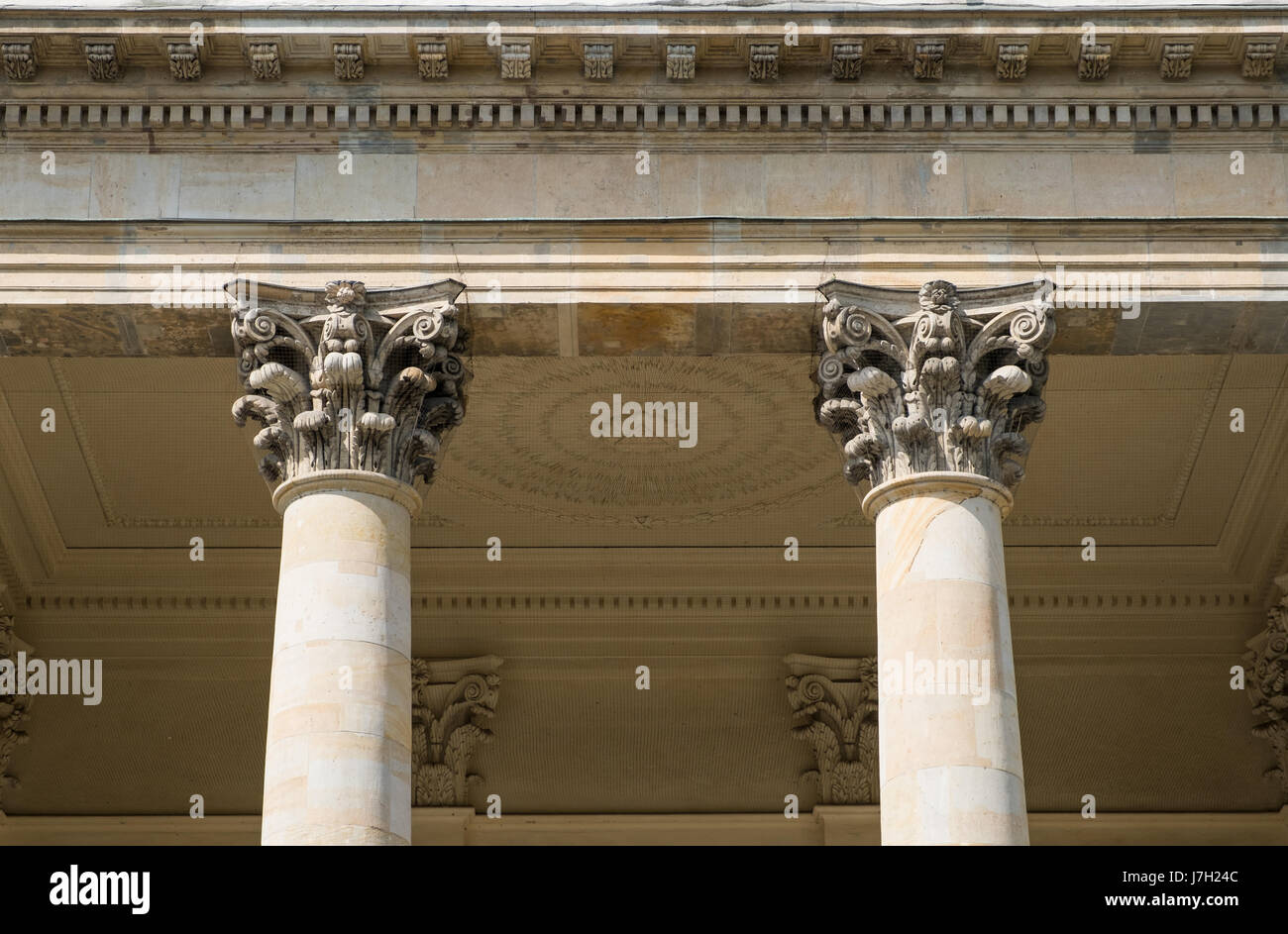 Two pillars / columns and capitals on historic architecture Stock Photo