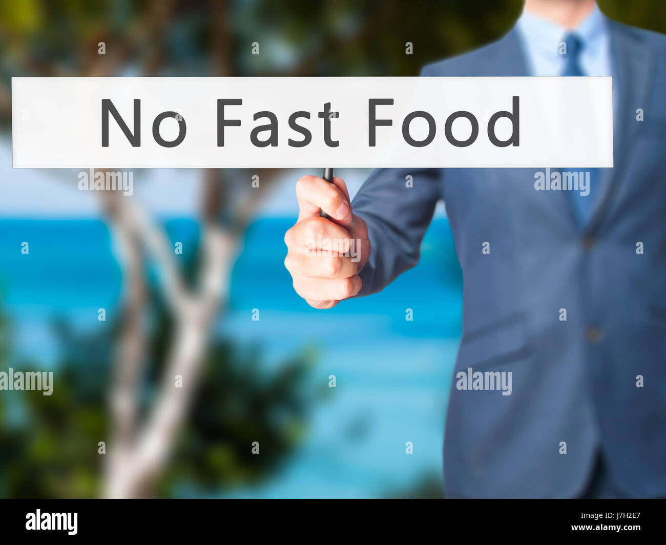 No Fast Sign No Fast Food - Businessman hand holding sign. Business, technology ...