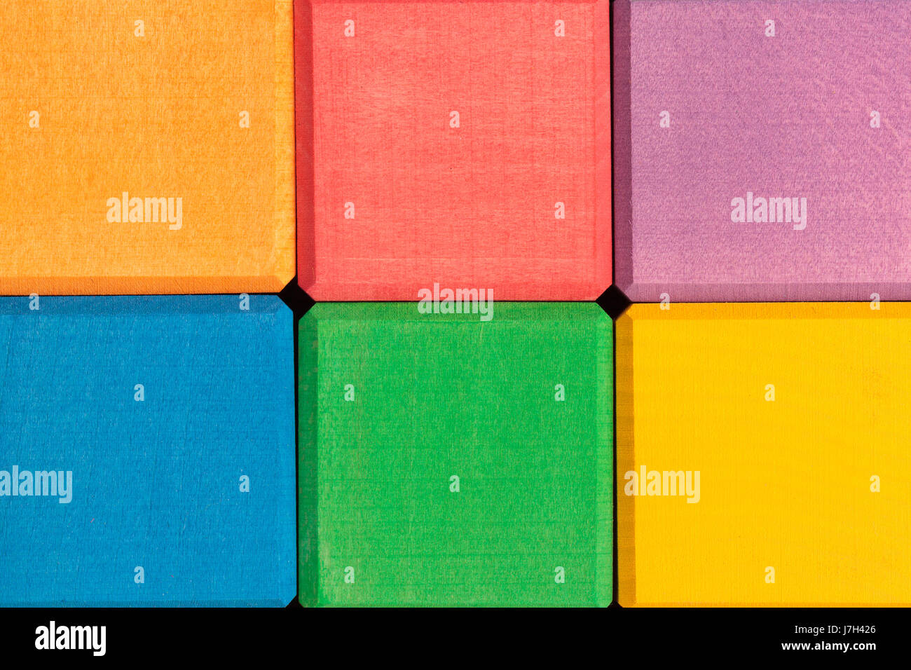 Colorful wooden cubes wall as background Stock Photo