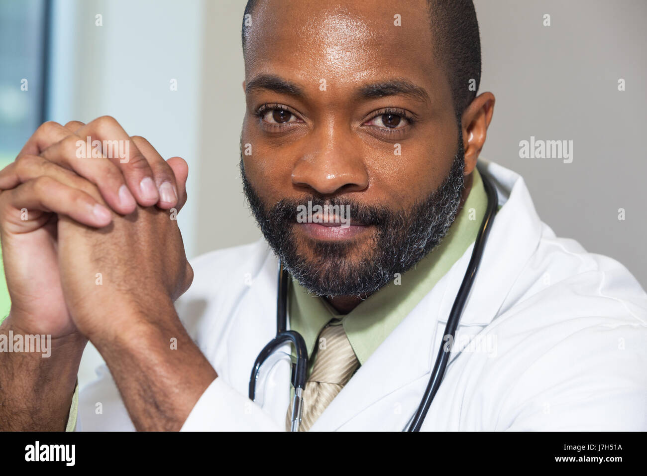 Doctor in black tie stethoscope hi-res stock photography and images - Alamy