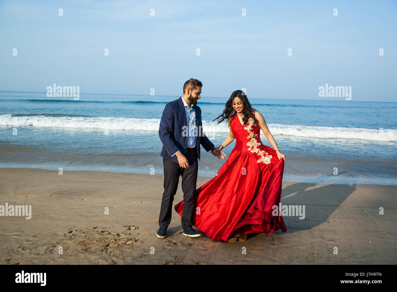 To be married couple having their engagement session done on Goa beach. Stock Photo