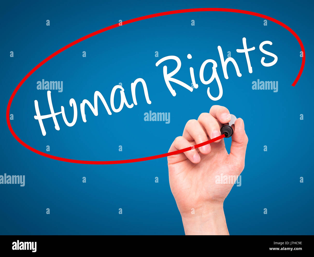 Human Rights In Cursive Man Hand writing Human Rights with black marker on visual screen ...