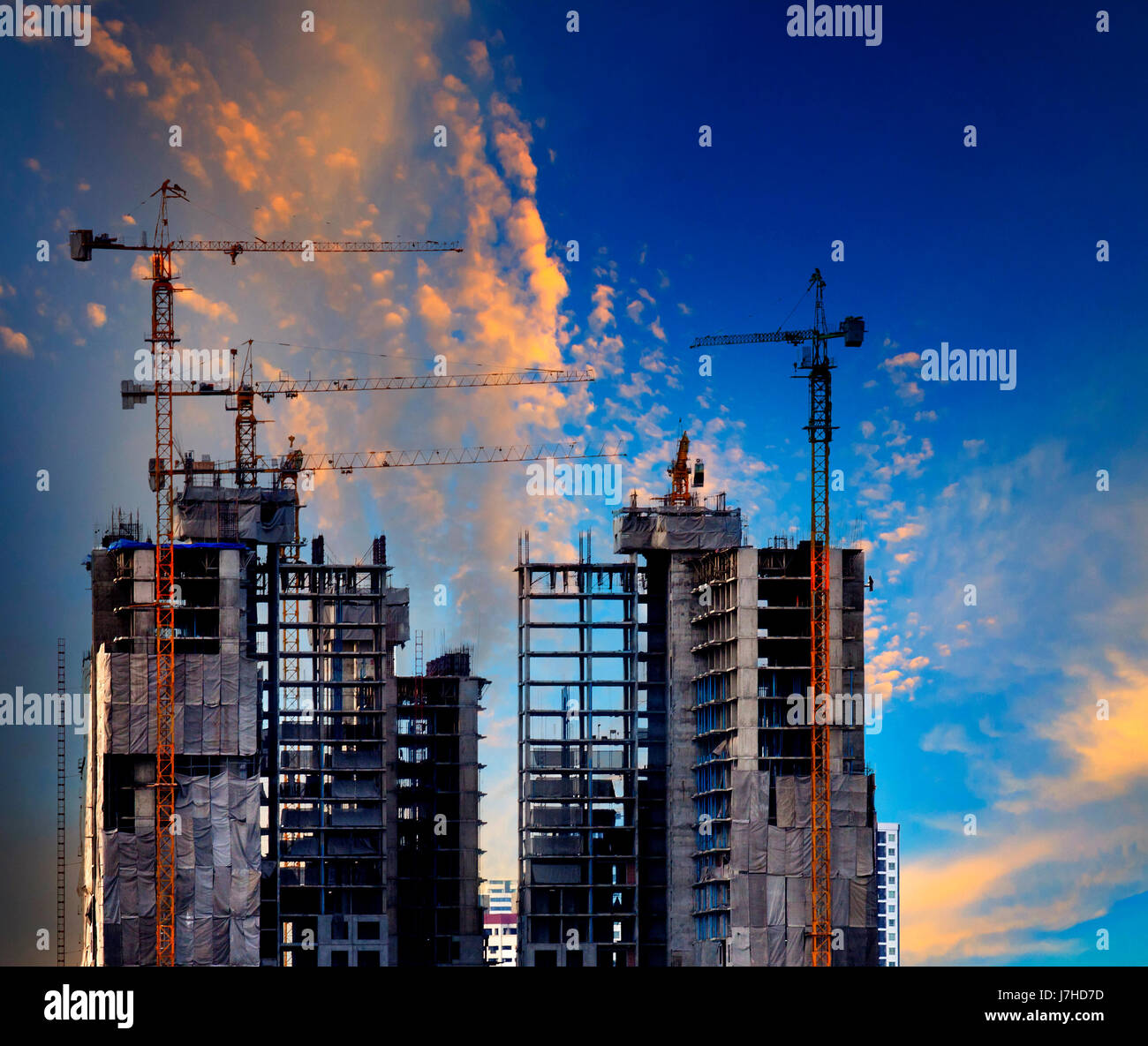 building construction site against beautiful blue sky use for ...