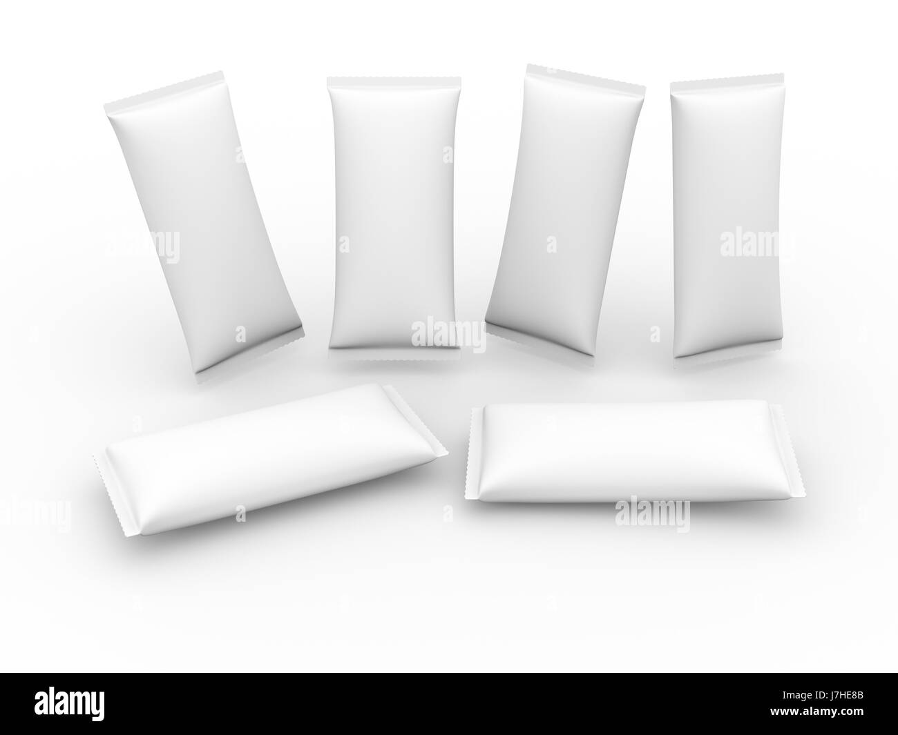 White blank flow wrap packet with clipping path, packaging or wrapper for Chocolate ,cookies, biscuit, milk bar, wafers, crackers, snacks or any kind  Stock Photo