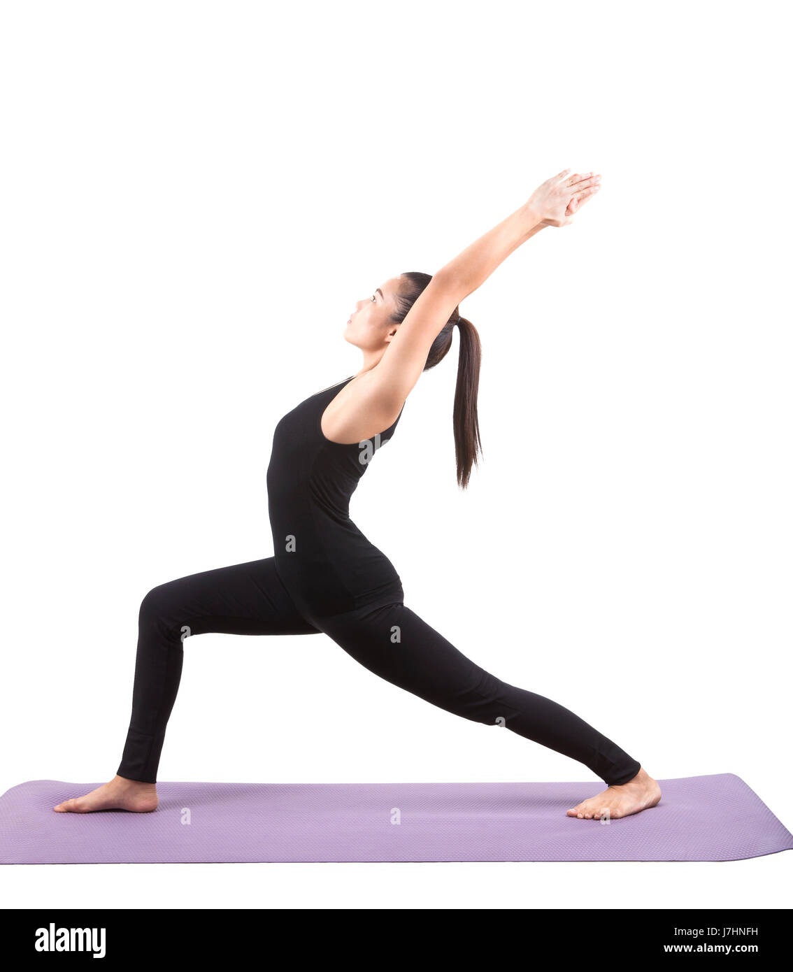 portrait of asian woman wearing black body suit sitting in yoga