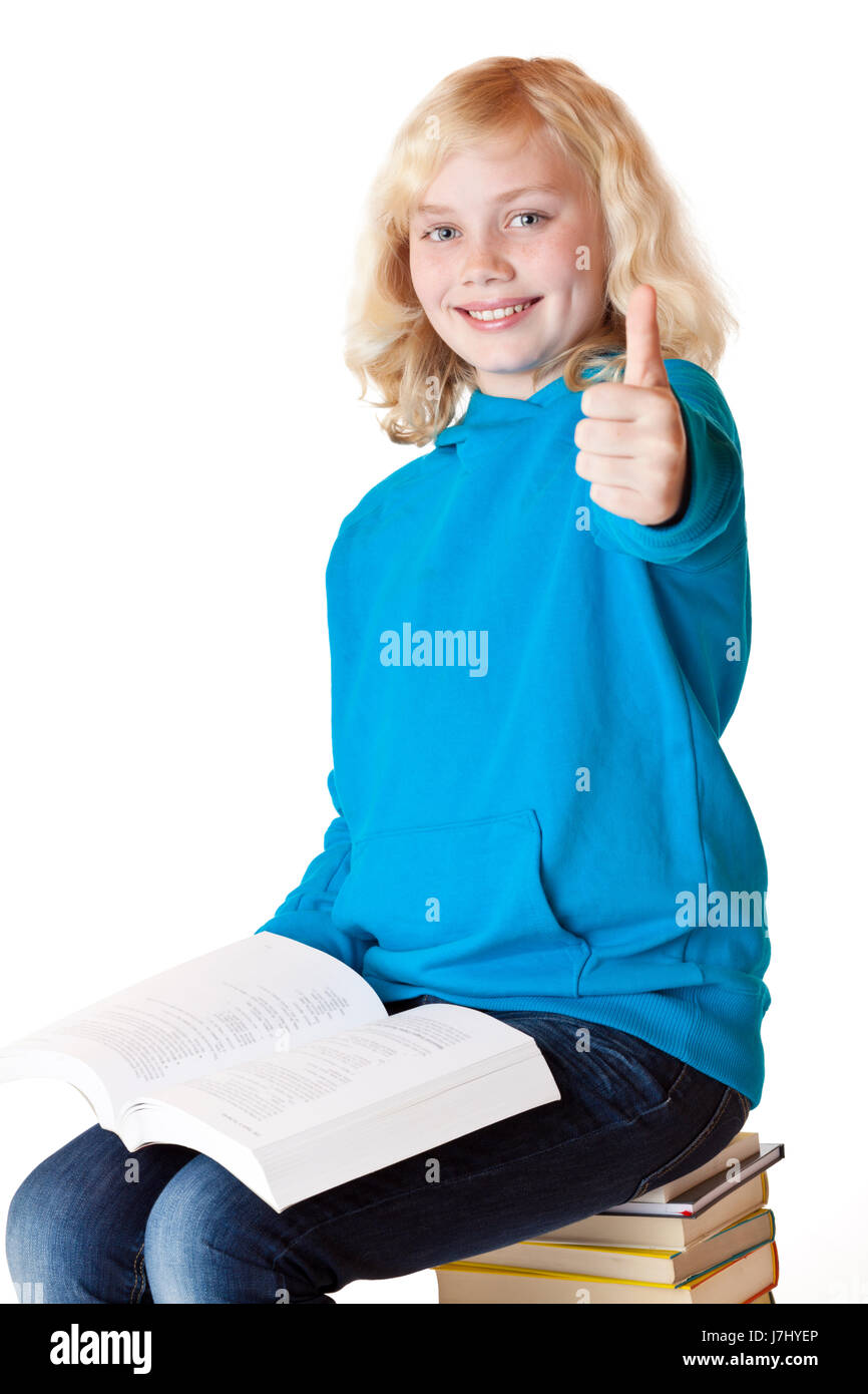 happy schoolgirl showing thumbs up Stock Photo - Alamy