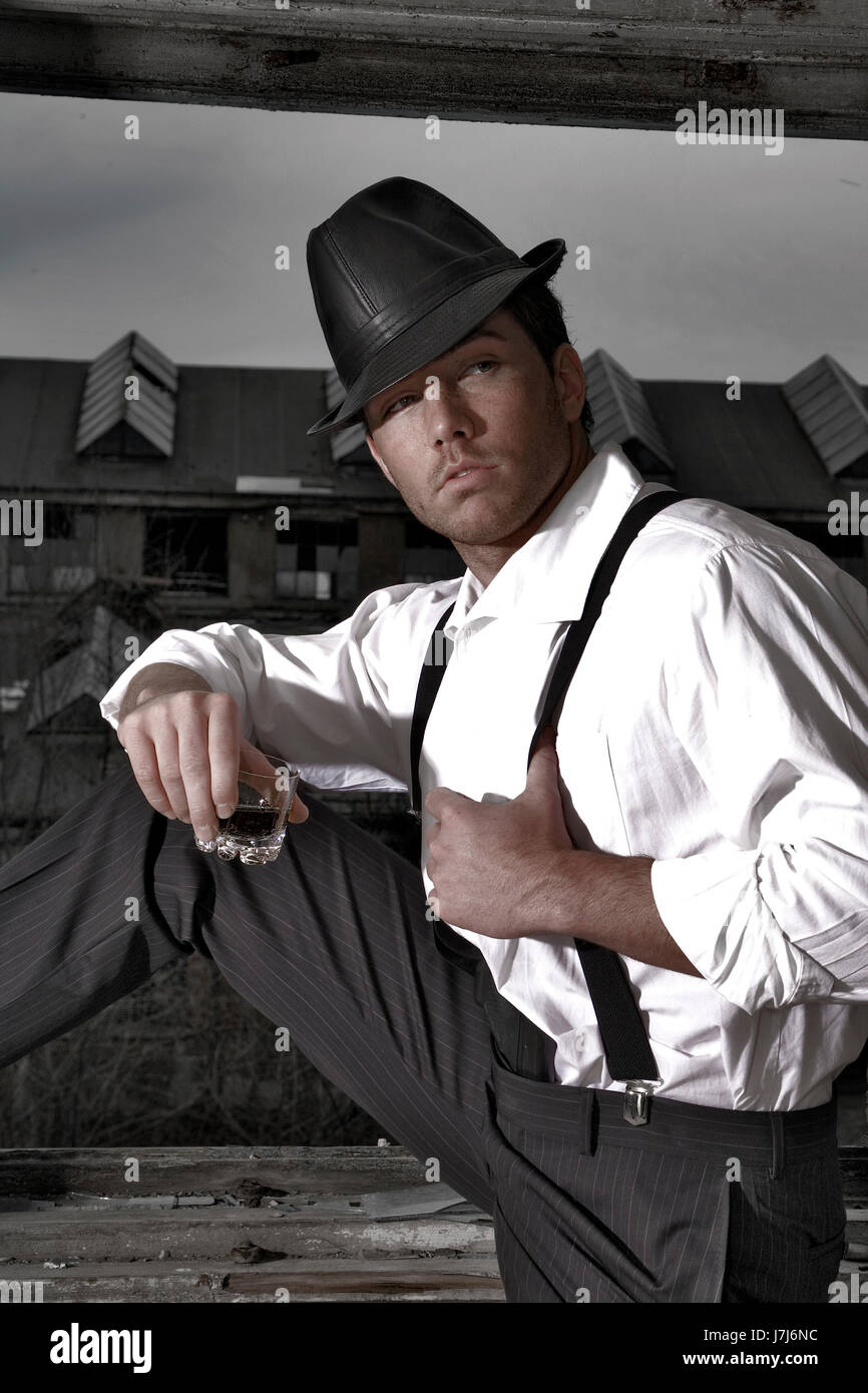 hat shirt pistol arm weapon pin striped imitate man fashion fashionable modern Stock Photo