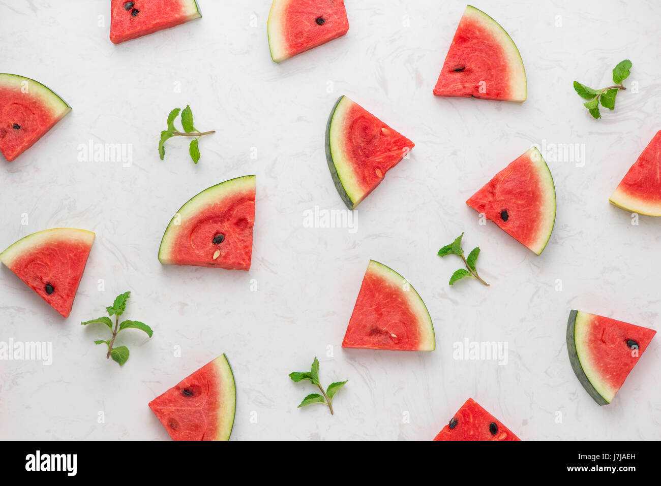 Fresh sliced watermelon on marble table in summertime Stock Photo