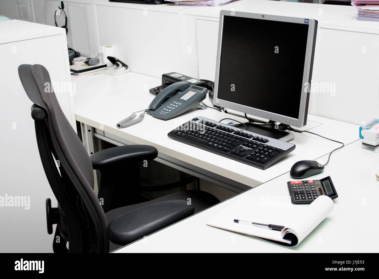 A Workplace Or Desk In Office With Monitor Phone Keyboard Mouse