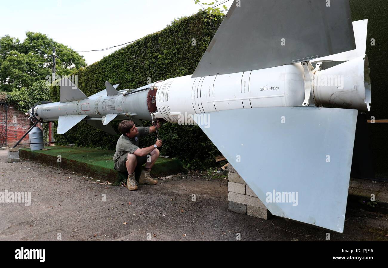Rupert van der Werff of Summers Place Auctions secures a rare Lavochkin V-760 military rocket during a press preview, which features as part of the Summers Place Auctions Garden and Conversation Pieces sale, in Billingshurst, West Sussex Stock Photo