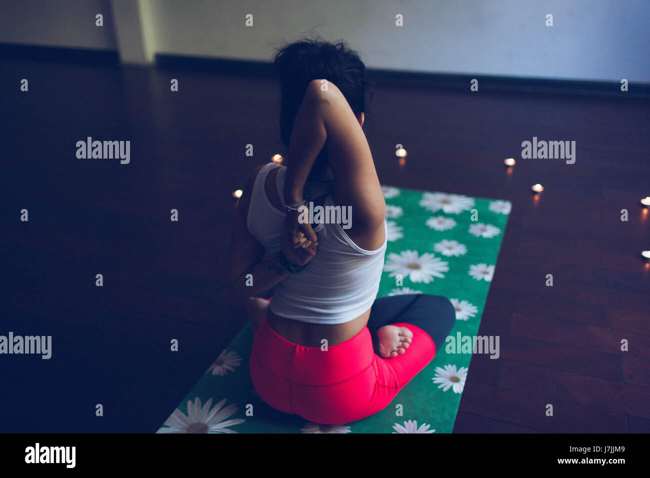 yoga instructor sits in asana Stock Photo Alamy