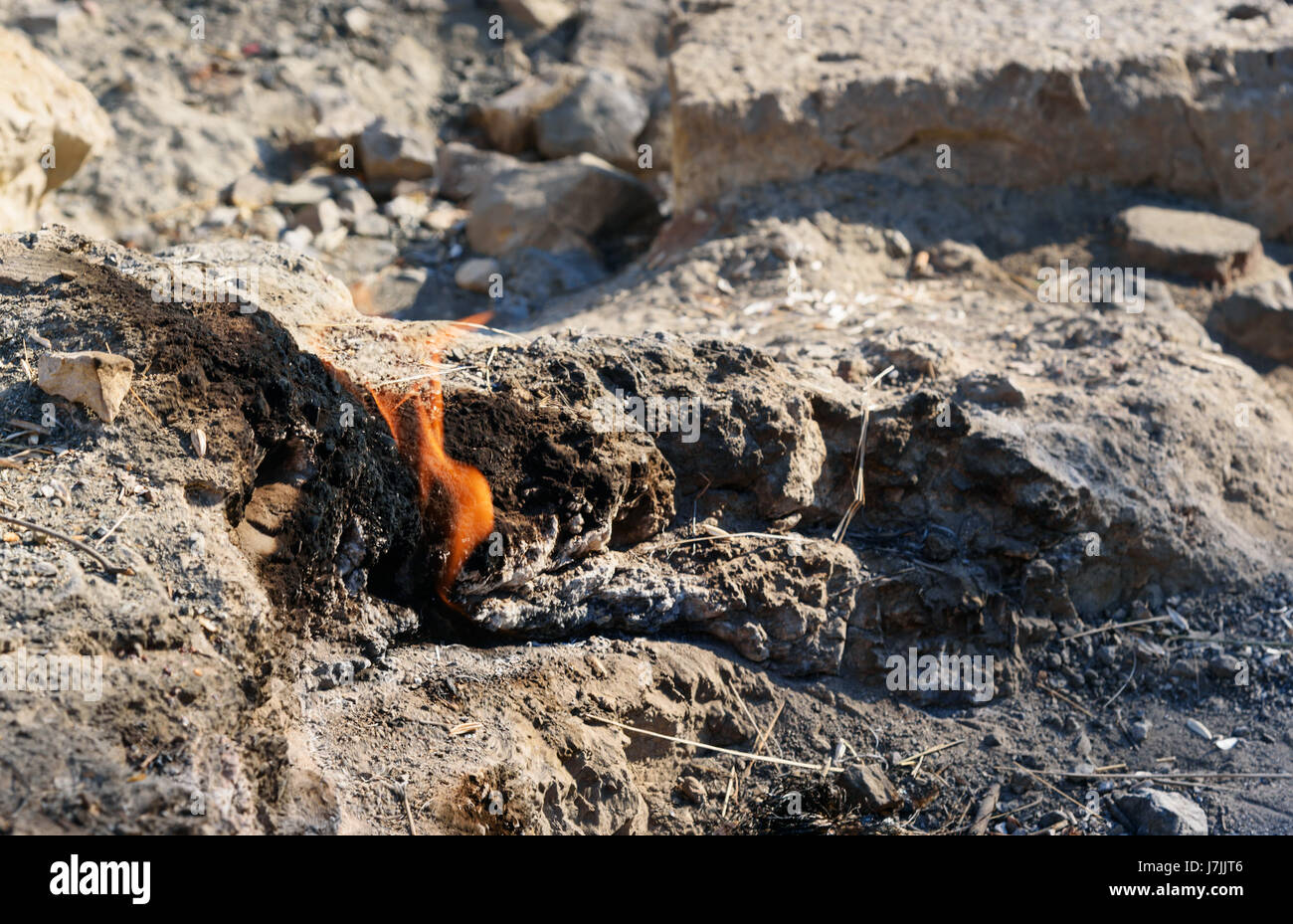Flames of Chimaera Mount from the ground. Fire from natural gas in the rocks. Turkey Stock Photo