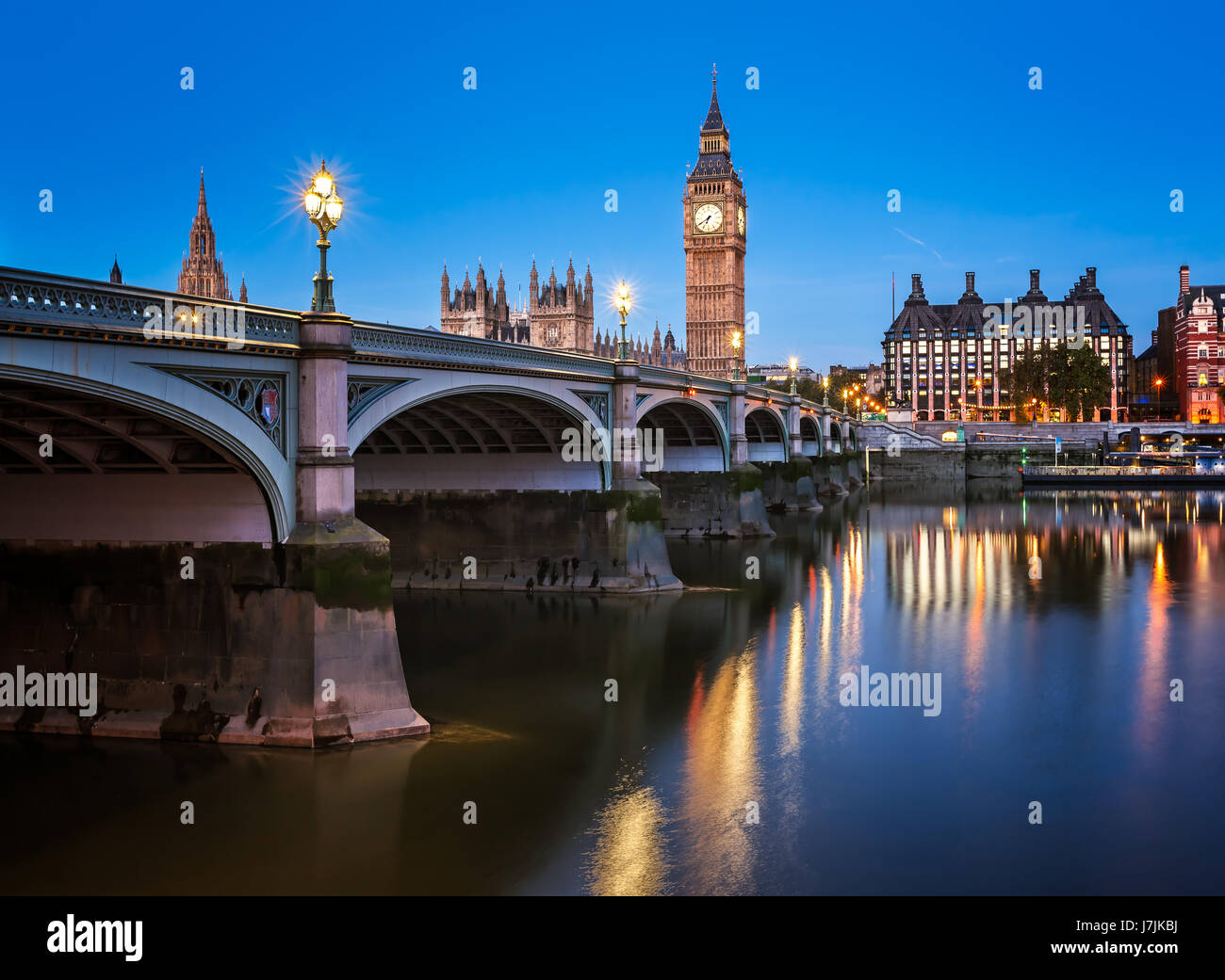 Big Ben, Queen Elizabeth Tower and Westminster Bridge Illuminated in the Morning, London, United Kingdom Stock Photo