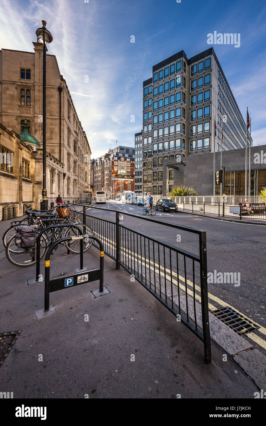 LONDON - OCTOBER 5, 2014: Typical sidewalk with Rental Bicycles Parking in London. Cycle hire scheme founded by Boris Johnson mayor of London and Barc Stock Photo