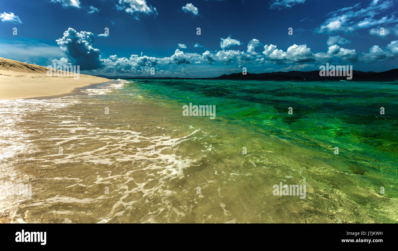 Gathering clouds at tropical shore Stock Photo