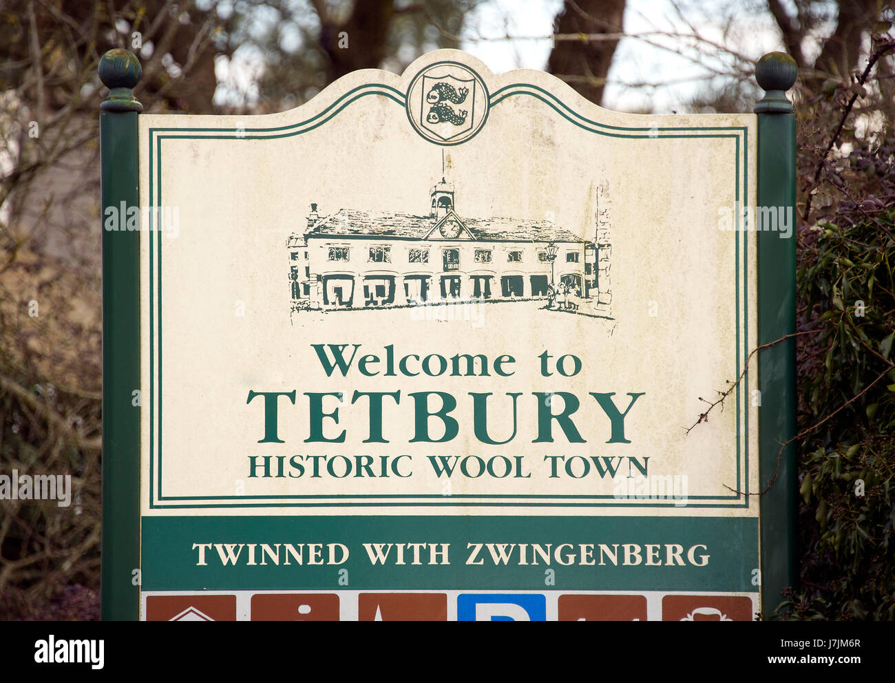 Tetbury showing the road sign and the Highgrove house entrance and warning sign. Stock Photo
