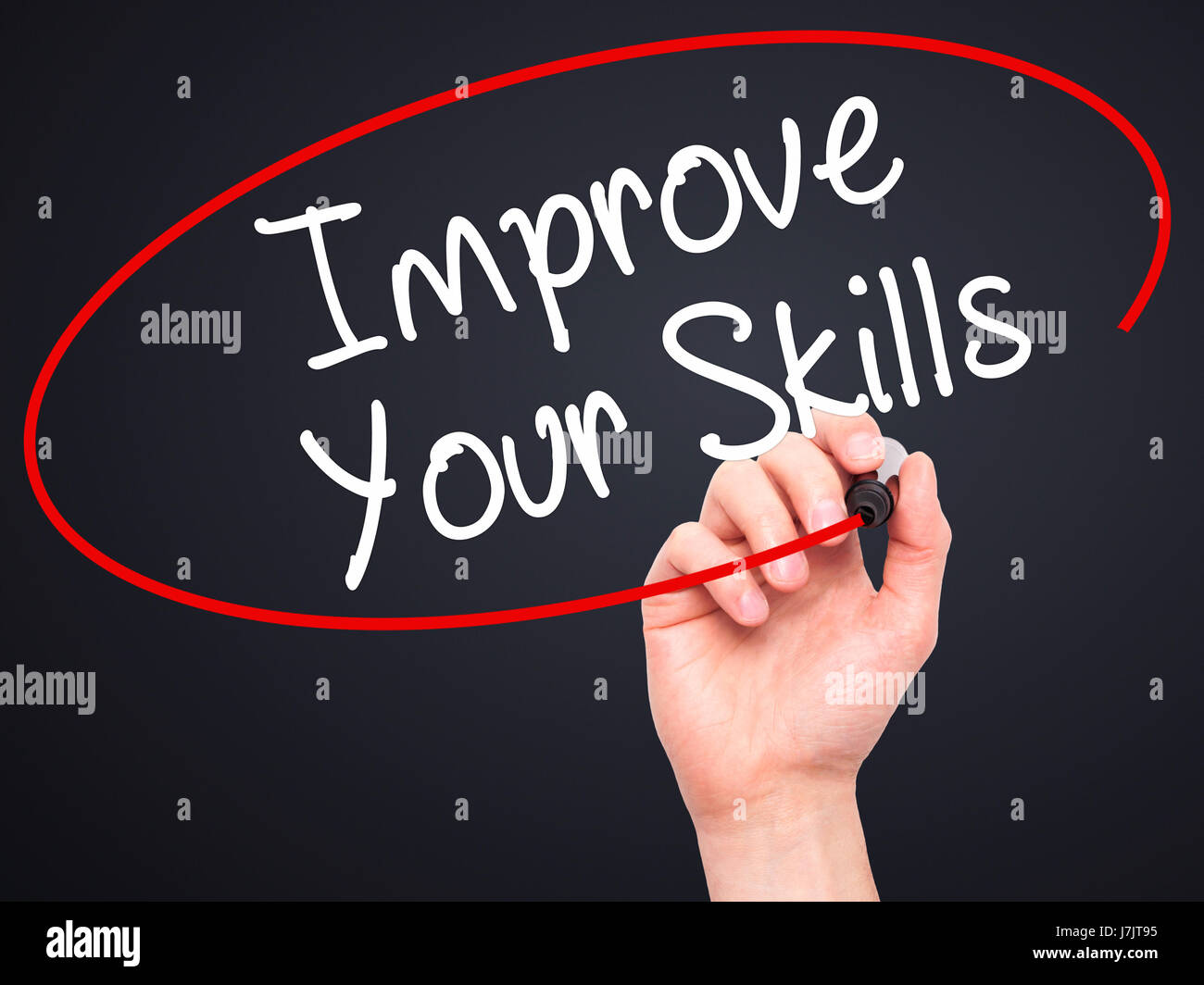 Man Hand writing Improve Your Skills with black marker on visual screen ...
