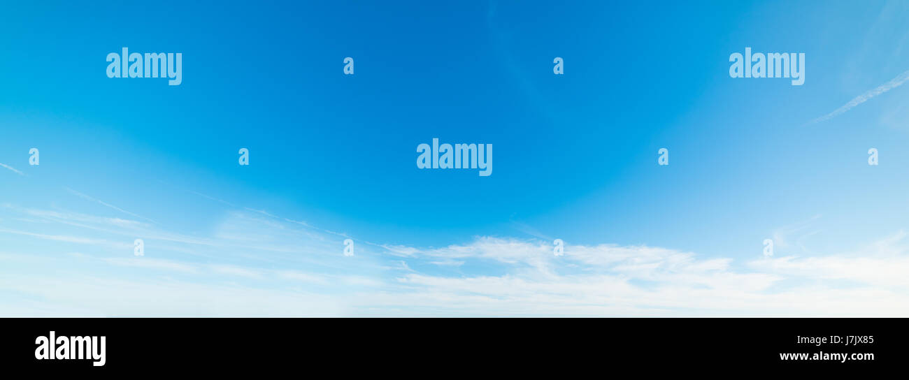 blue sky with white, soft clouds Stock Photo - Alamy