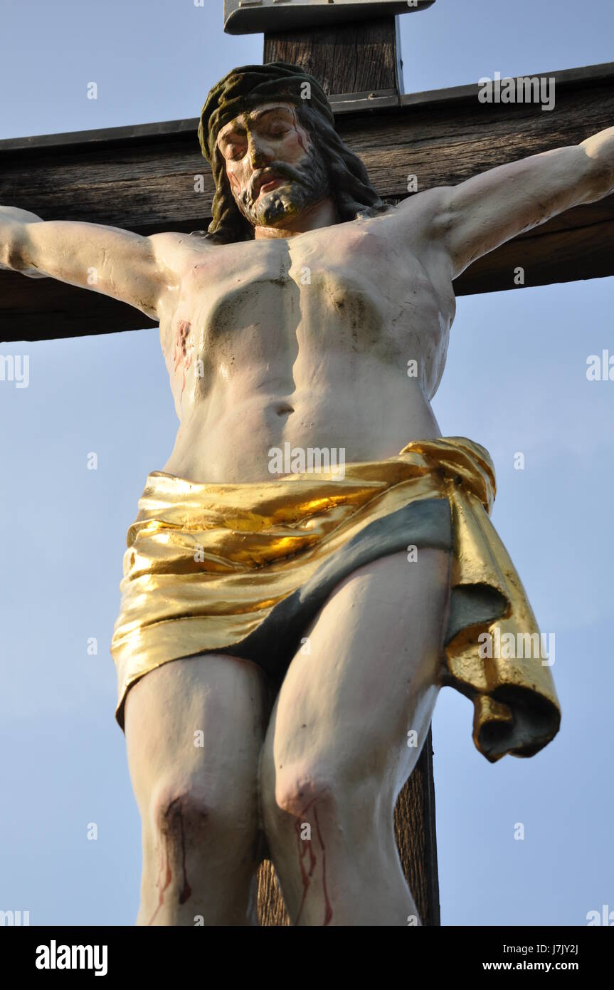 belief cross pain crucifix crucifixion crucified holy sacred jesus blue  Stock Photo - Alamy