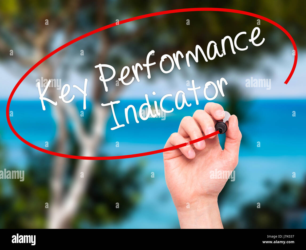 Man Hand writing Key Performance Indicator with black marker on visual ...