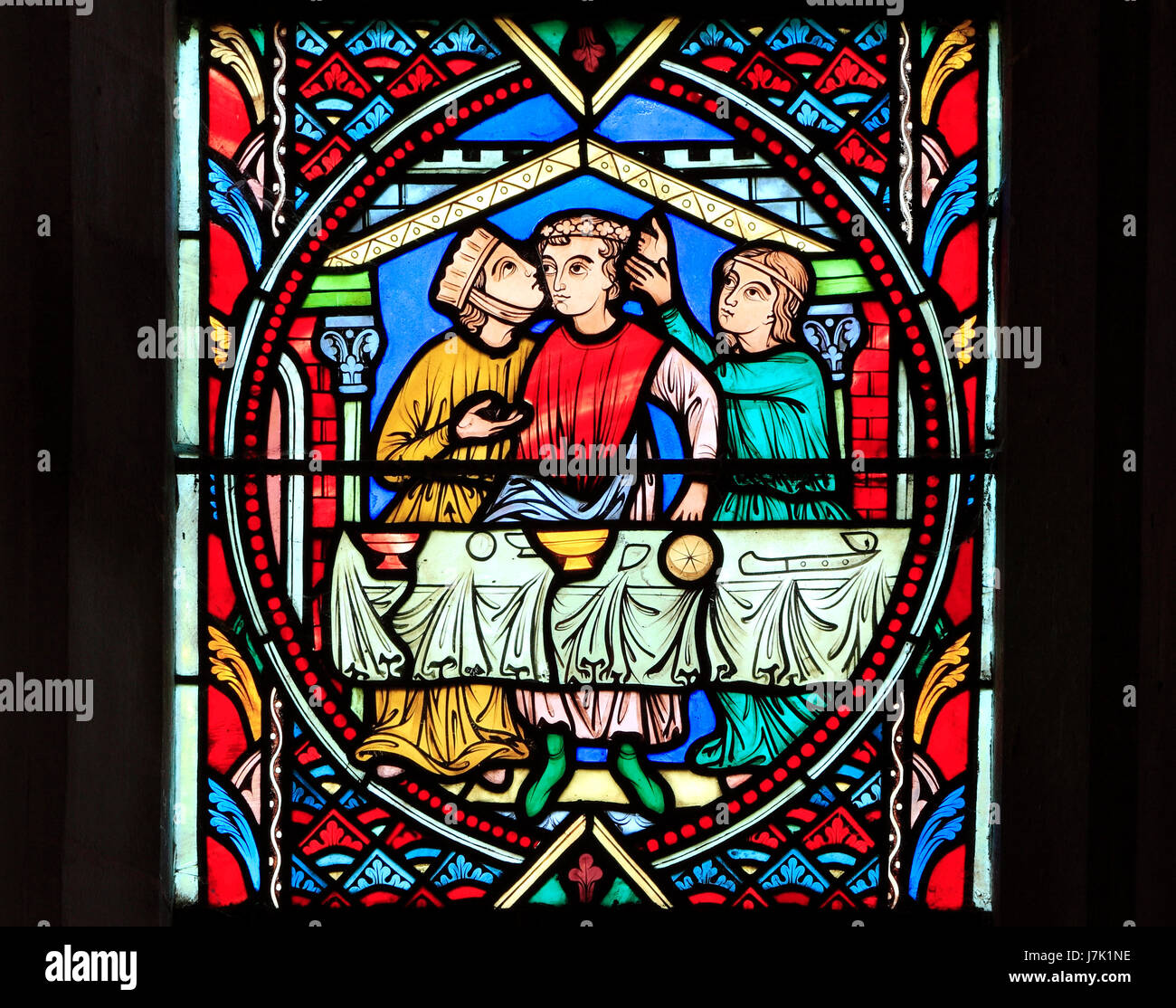 Parable of The Prodigal Son, by Adolph Didron of Paris, 1859.  Stained glass window, Feltwell Church, Norfolk,The Prodigal Son squandering Stock Photo