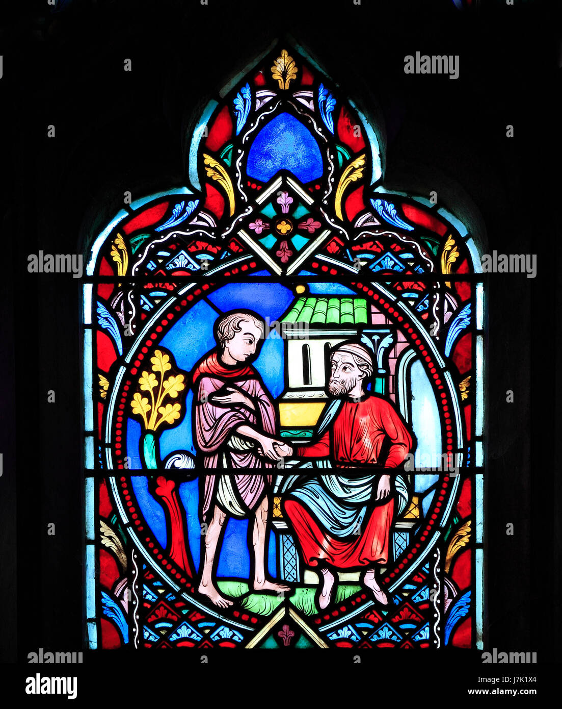 Parable of The Prodigal Son, by Didron of Paris, 1859.  Stained glass window, Feltwell Church, Norfolk, England, UK, The Prodigal Son welcomed home Stock Photo